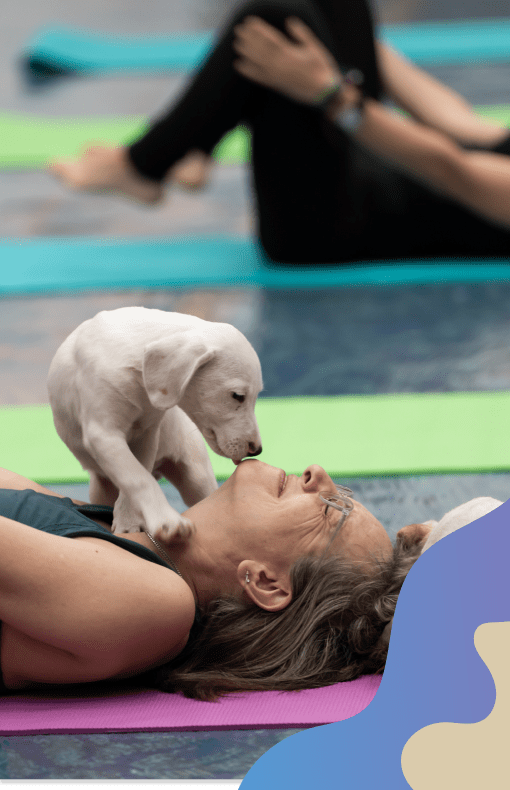 An attendee at Puppy Yoga